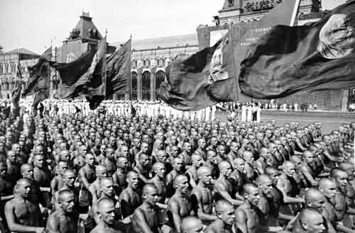 "Marching together" ("Nashi"-"Our Guys") in the 1935 version. (Photo by M. Markov-Grinberg, "At the Athletic Parade on Red Square.")